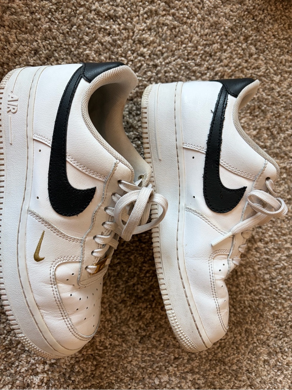 Nike White and Black Leather Sneakers with Gold Accent